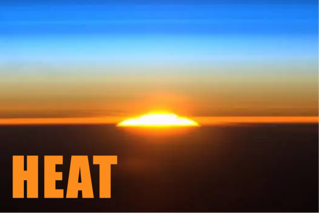 Through layers of blue and orange sky, the bright disc of the Sun is rising. The image is labeled "HEAT."